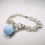 Thumbnail: Bracciale chiama angeli smaltato azzurro strass bianco