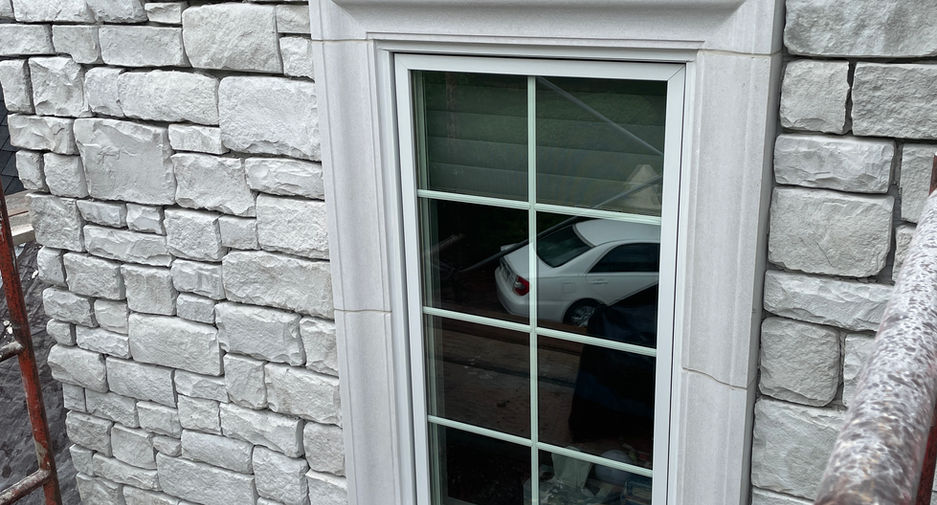 J&N stone veneer installation on residential exterior wall in Illinois