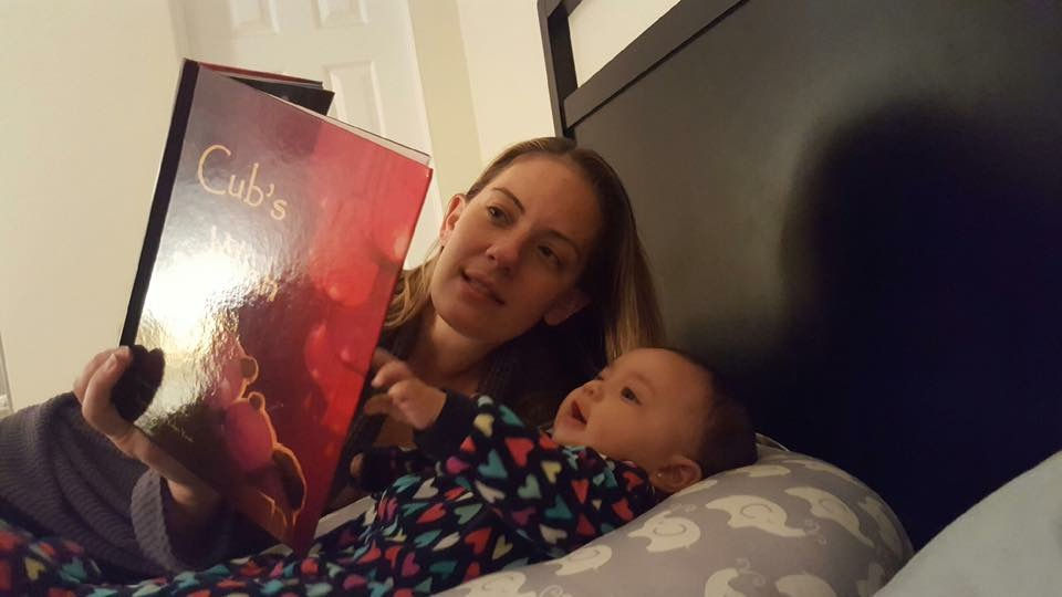Sarah reading with her angel
