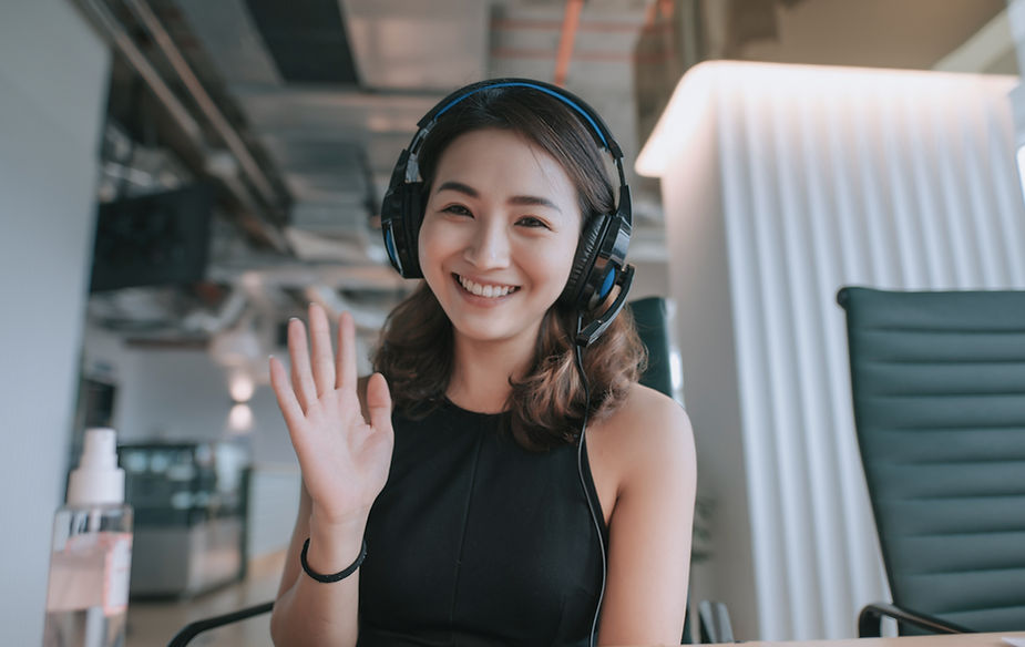 Waving in Headphones_edited.jpg