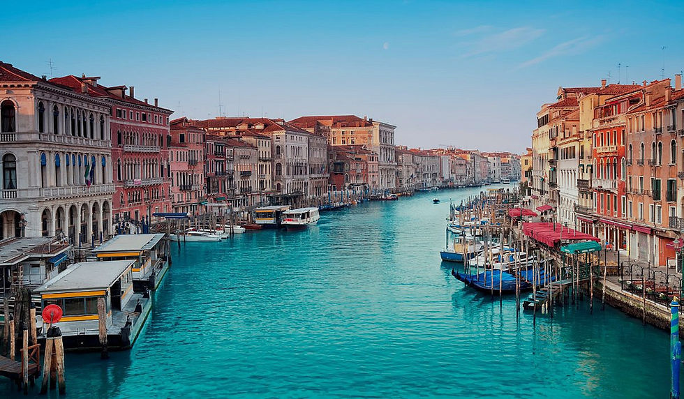 Voyages Flammang travel agency at Massen — Venice canal view with gondolas, symbolizing worldwide travel destinations