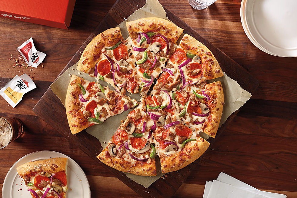 Close-up of large pizza with toppings at Pizza Hut in Massen