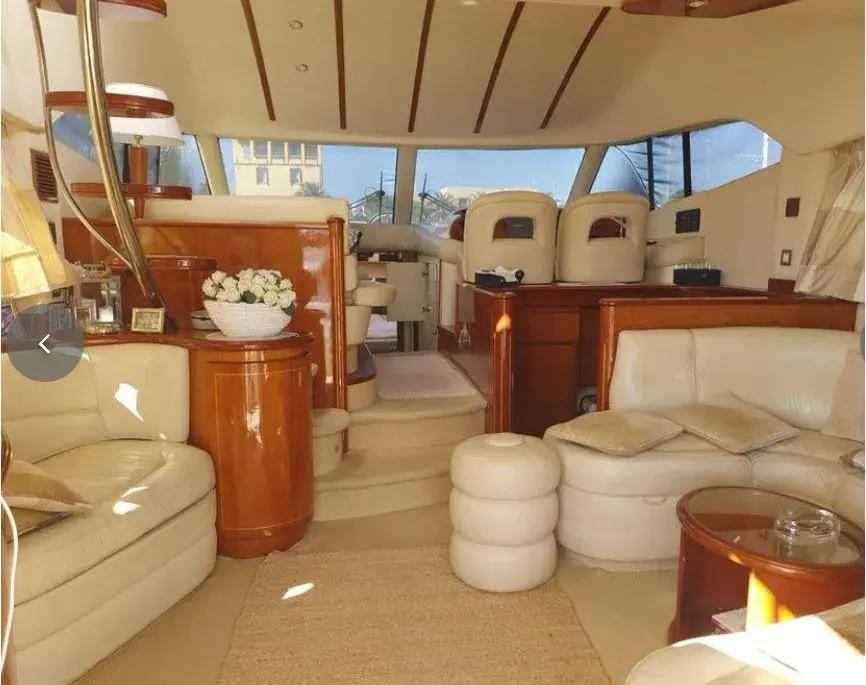Wood-panelled salon interior aboard the Humilitas I Rodman 56 charter yacht