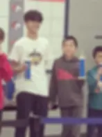 young chess player receiving medal in Illinois chess tournament