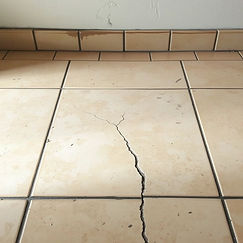 tile floor with one cracked tile.jpg