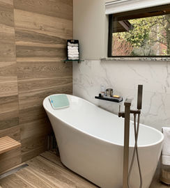 Modern soaking tub-shower combo.