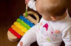 baby with xylophone.png