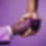 diverse people shaking hands with purple tones.jpg