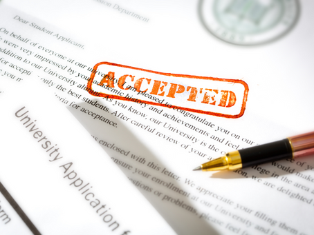 University Application With Accepted Stamped On It