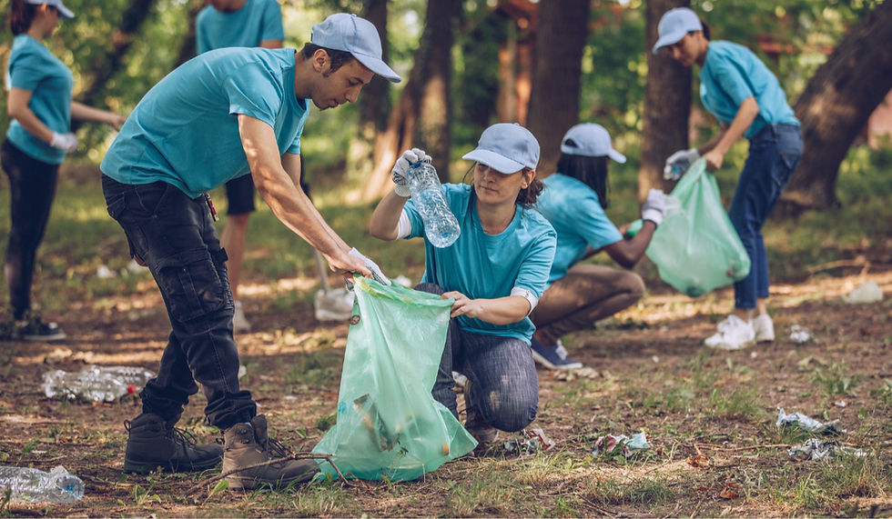 A high school student picking up trash for community service