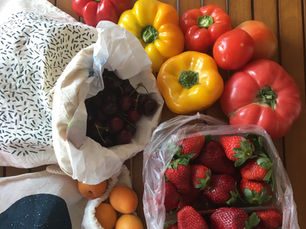 Fresh produce including strawberries and bell peppers on a table, How to Stop UTI Recurrence with Healthy Eating