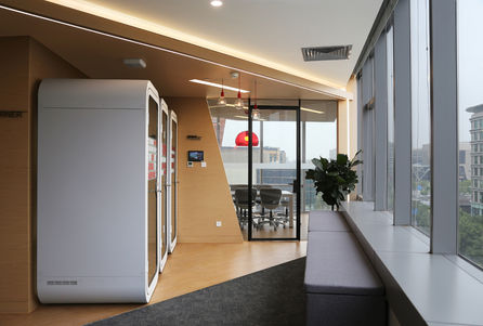 View towards meeting room with dynamic wood and ceiling system