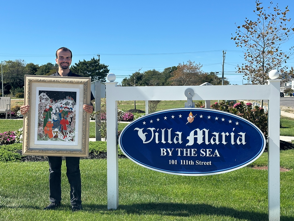 Holding the framed serigraph gifted to Villa Maria by the Sea.