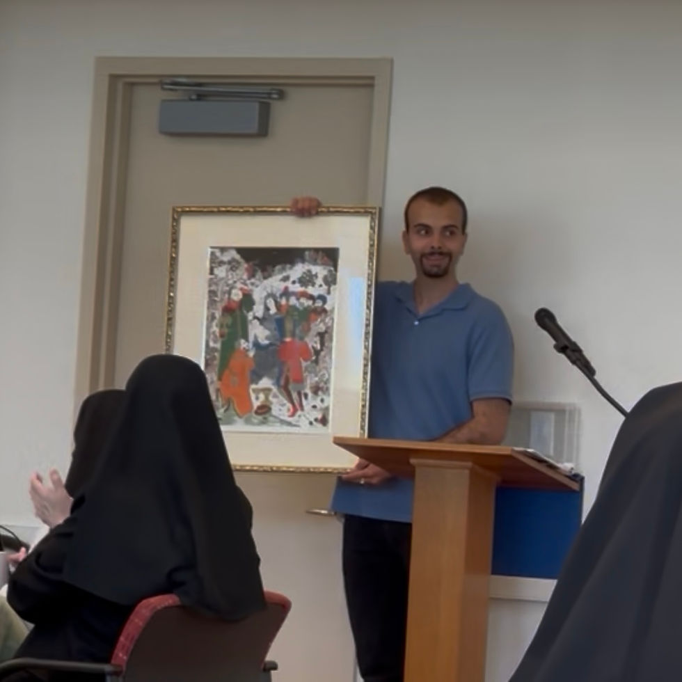 Presenting a framed serigraph to the Sisters of Christian Charity at Malinckrodt Convent.