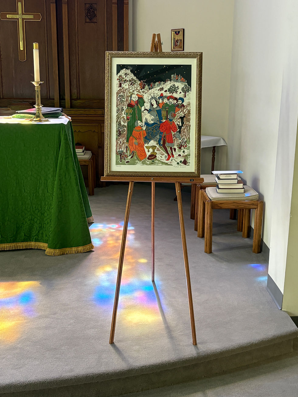 A closeup of the serigraph displayed during the dialogue homily (note the pretty reflections of the stained glass on the altar)