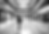 wide view of african business man walking through busy lobby of corporate office.jpg
