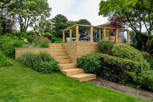 Wooden Decking on steep slope with wooden steps