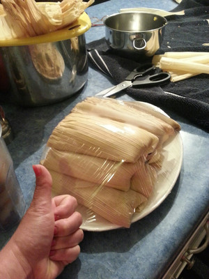 Homemade tamales is a labor of love. Homemade organic masa is leaps and bounds better than the store-bought brands. Organic corn has a better flavor, and if you grow your own, the quality is higher because you can pick out the bad kernels that often get missed in commercial processing. Nixtamalizing corn is a long process, but worth the days it takes to make it. Different colored corn can bring some excitement and fun to the dish. I smoke pork picnic roasts heavy with Mexican spices to stuff the tamales with a generous amount of masa. I know they are not traditional. This is my Americanized version designed for feasting.
Breakfast tamales can be made by adding sugar or maple syrup to the masa. Filling them with scrambled eggs and or sausage makes for a fulfilling Sunday brunch. Precooked, they can quickly be thawed and reheated in a steamer, without compromising texture for a fast full-on breakfast.