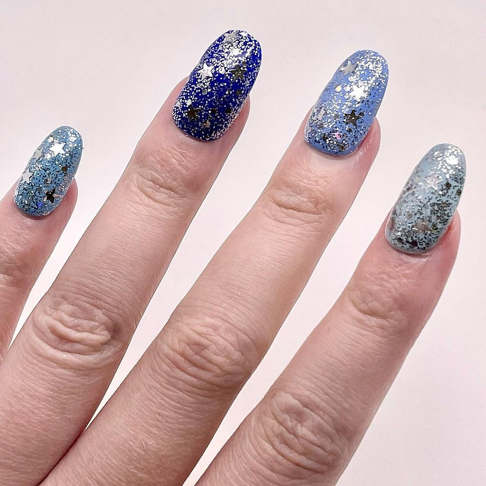 Thumbnail: clean beauty glitter nail polish with stars