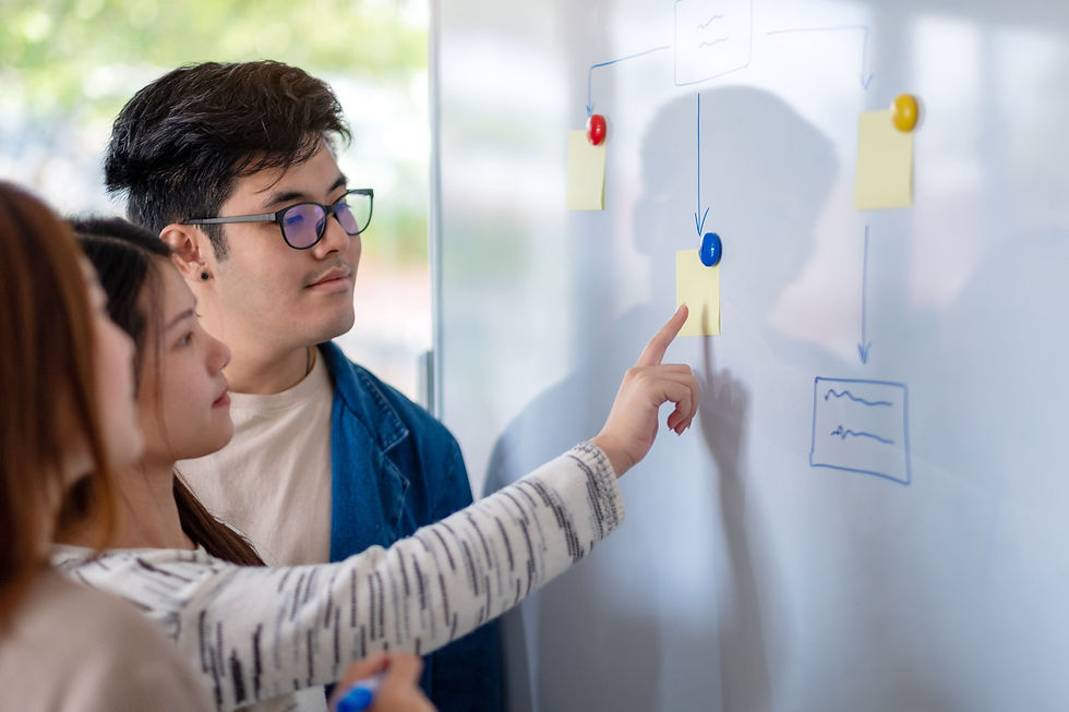 group-of-business-people-looking-and-discussing
