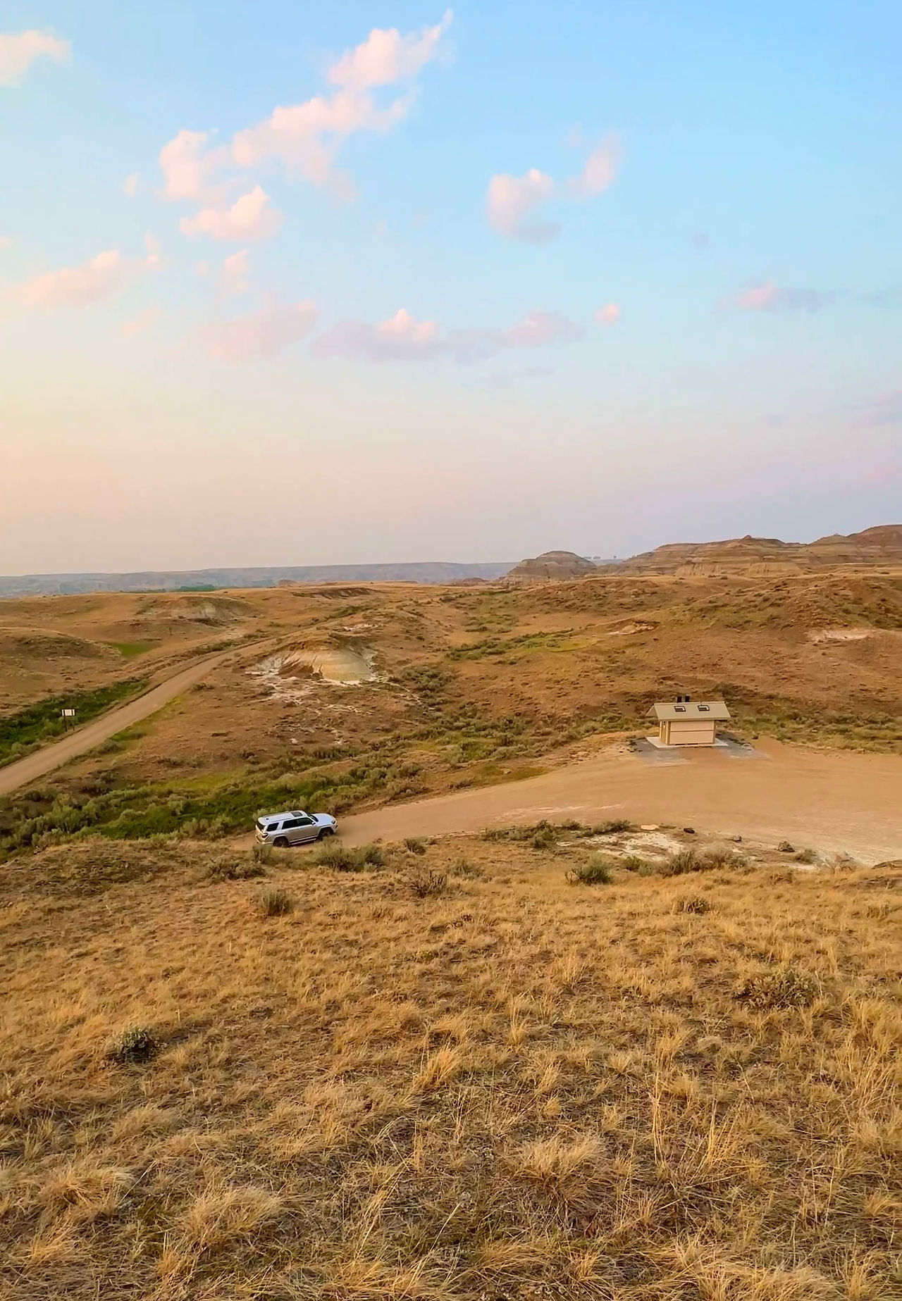 Toyota driving through dinosaur provincial park 