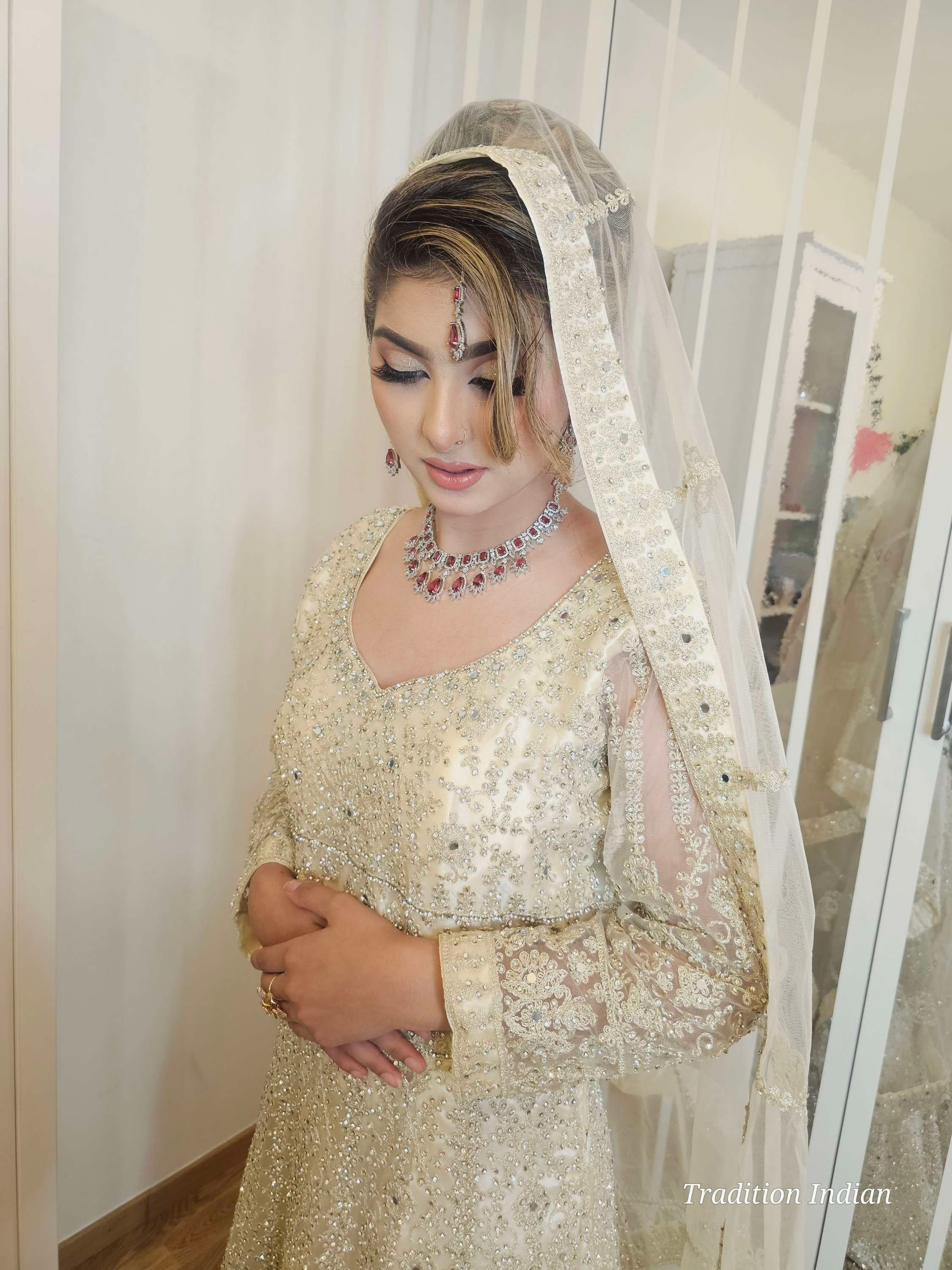 Bridal Tail gown handwork with mirror and stone work 