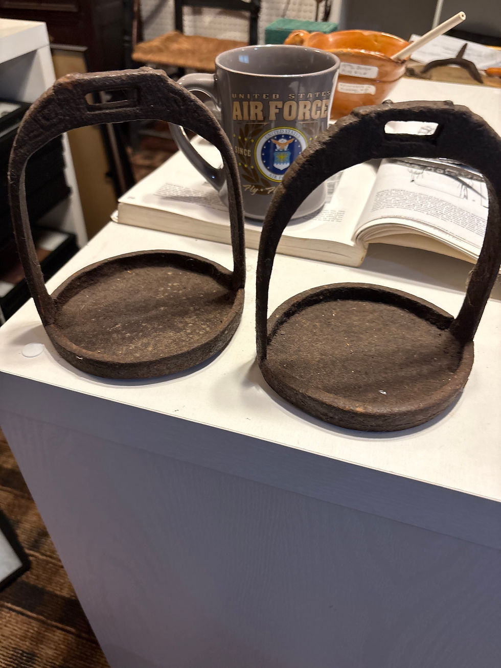 Thumbnail: 17th century sand cast decorated iron stirrups matching pair