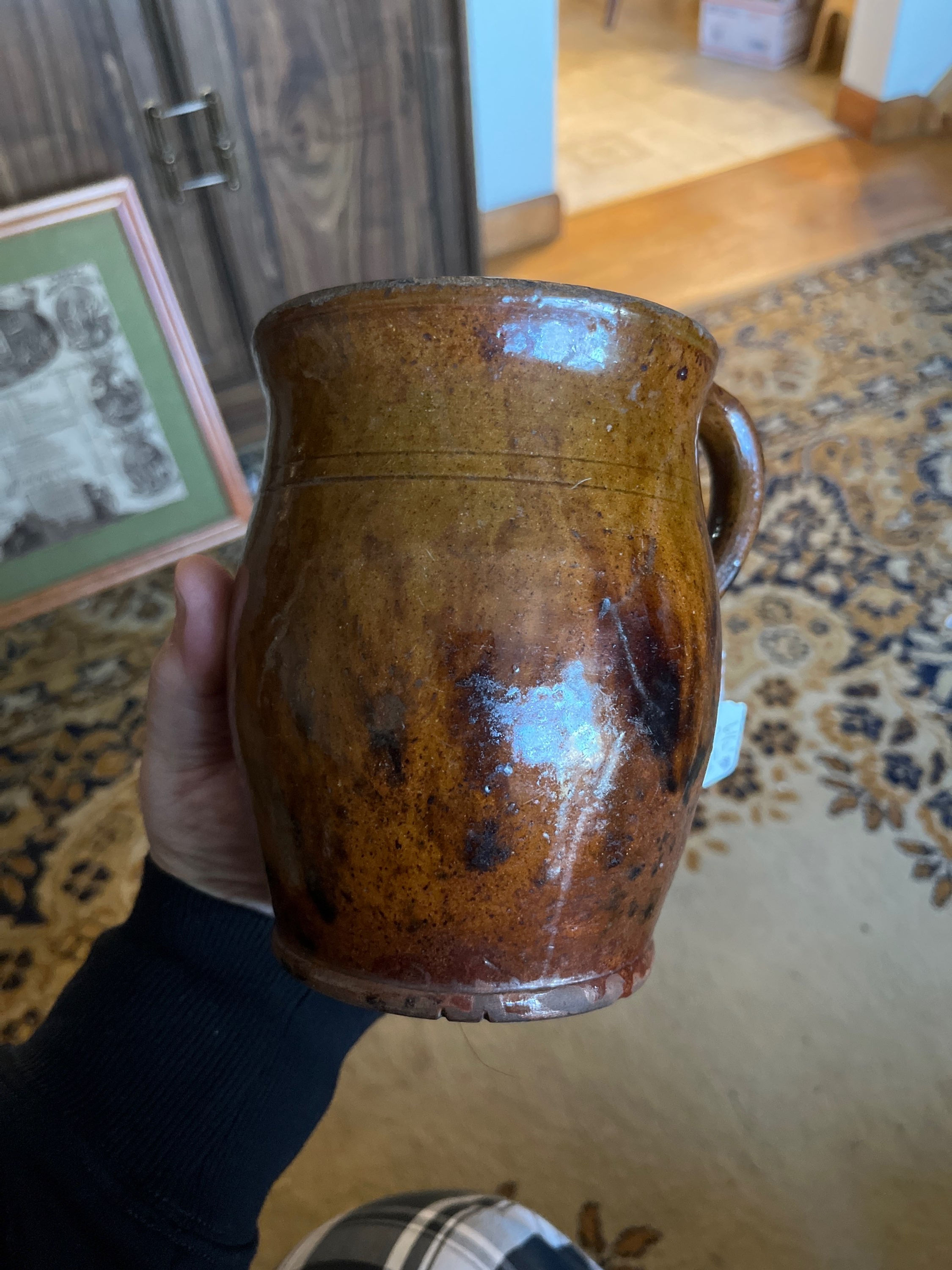 Early 19th century Pa. Redware jar with handle and slip design 6 1/2 