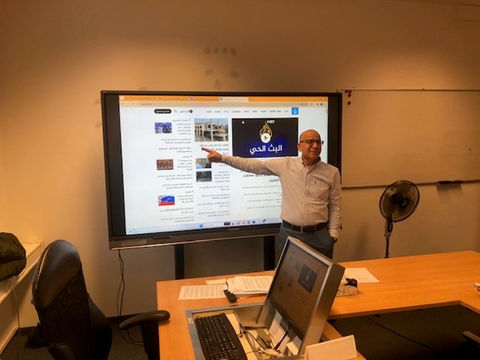 culmen language instructor teaching in a classroom