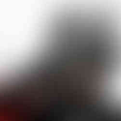 Valeriu Mladin in his studio, working on monumental drawings from the Political Bestiary series; documentary images taken over 12 years, capturing the working atmosphere, the scale of the studio, the creative process and the charcoal technique, with hybrid figures combining human bodies and animal heads.