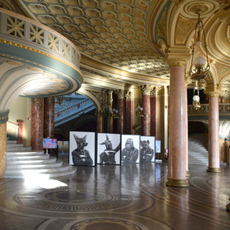 Eight works from Valeriu Mladin’s Political Bestiary series, exhibited at the SHARP Festival organized by pianist Daniel Ciobanu at the Romanian Athenaeum in Bucharest; monumental charcoal drawings with hybrid figures, conceived as a striking visual contrast and an unexpected dialogue with the neoclassical architecture of the grand building.
