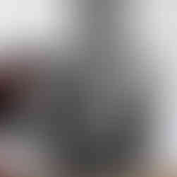 Valeriu Mladin in his studio, working on monumental drawings from the Political Bestiary series; documentary images taken over 12 years, capturing the working atmosphere, the scale of the studio, the creative process and the charcoal technique, with hybrid figures combining human bodies and animal heads.