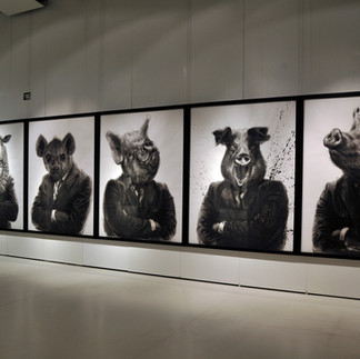 Valeriu Mladin – charcoal drawing on Canson paper from the Political Bestiary series, solo exhibition at Galateca Gallery, Bucharest; monumental works depicting humans with animal heads as metaphors of the political world Valeriu Mladin – desen în cărbune pe hârtie Canson din seria Political Bestiary, expoziție personală la Galeria Galateca, București; lucrări monumentale care reprezintă oameni cu cap de animale, metafore ale lumii politice