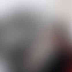 Valeriu Mladin in his studio, working on monumental drawings from the Political Bestiary series; documentary images taken over 12 years, capturing the working atmosphere, the scale of the studio, the creative process and the charcoal technique, with hybrid figures combining human bodies and animal heads.