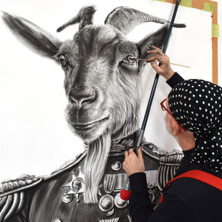 Valeriu Mladin in his studio, working on monumental drawings from the Political Bestiary series; documentary images taken over 12 years, capturing the working atmosphere, the scale of the studio, the creative process and the charcoal technique, with hybrid figures combining human bodies and animal heads.