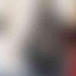 Valeriu Mladin in his studio, working on monumental drawings from the Political Bestiary series; documentary images taken over 12 years, capturing the working atmosphere, the scale of the studio, the creative process and the charcoal technique, with hybrid figures combining human bodies and animal heads.