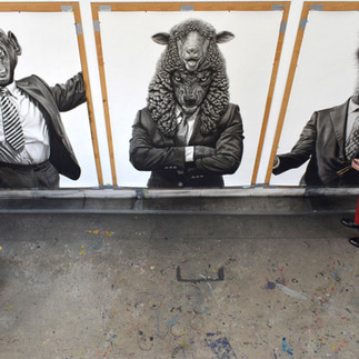 Valeriu Mladin in his studio, working on monumental drawings from the Political Bestiary series; documentary images taken over 12 years, capturing the working atmosphere, the scale of the studio, the creative process and the charcoal technique, with hybrid figures combining human bodies and animal heads.