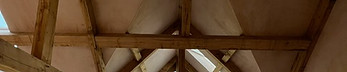 Plastered ceiling in oak frame house