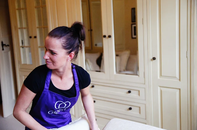 Girl cleaning the room