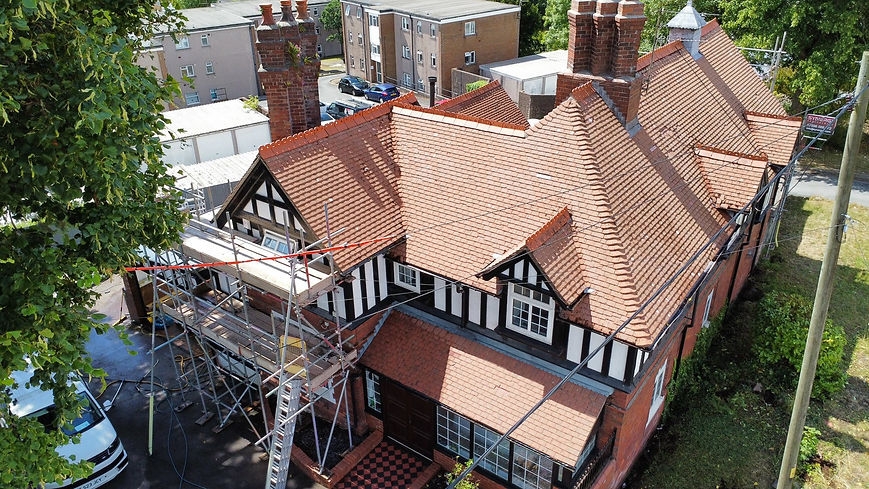 Large home with red roof tiles