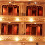 Intricate balconies with red decor 