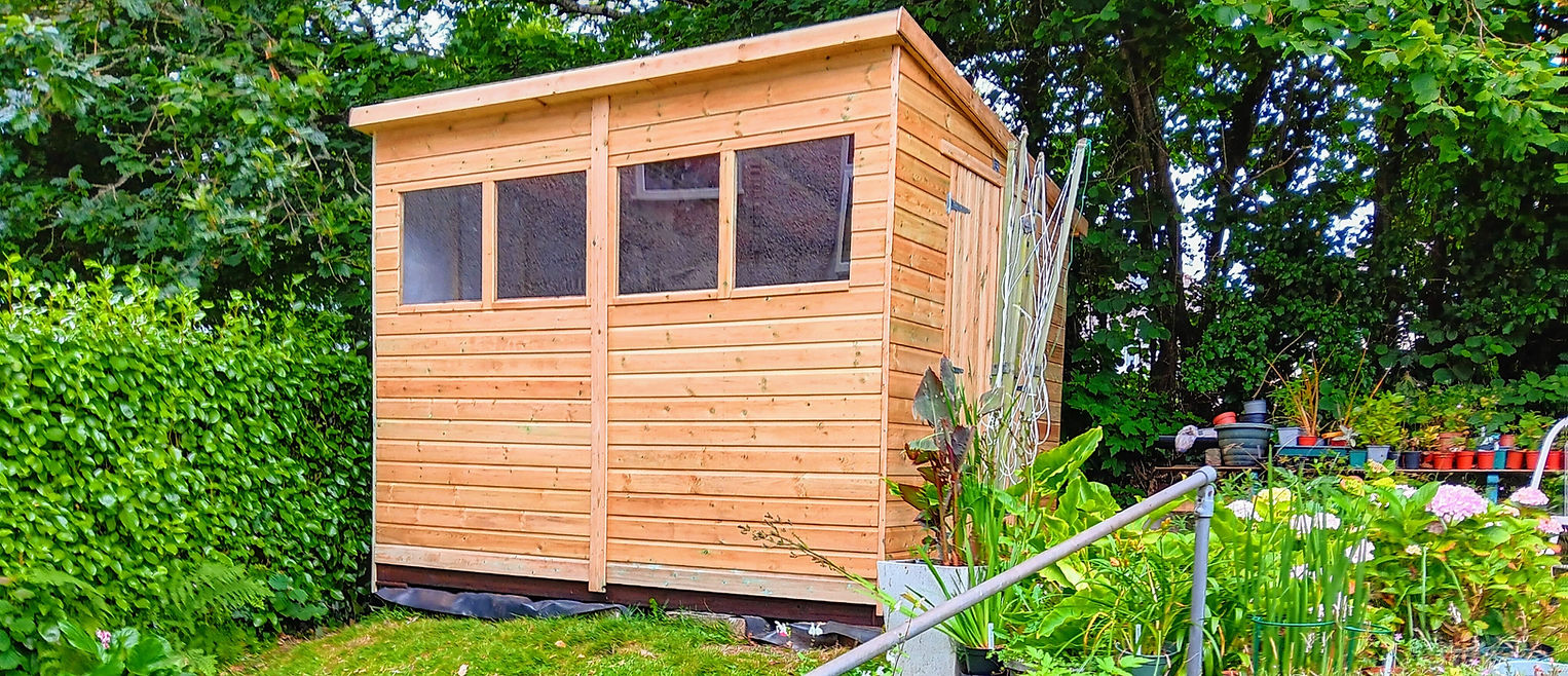Garden shed with slope roof and windows