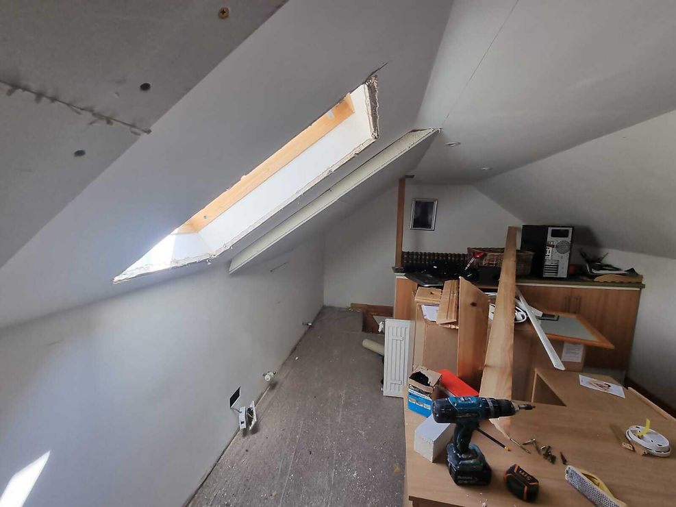 Loft space with insulation material laid between joists