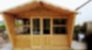 Large shed with apex roof and windows
