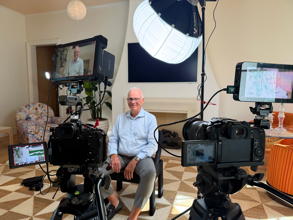 Behind the scenes video production setup for a business interview.