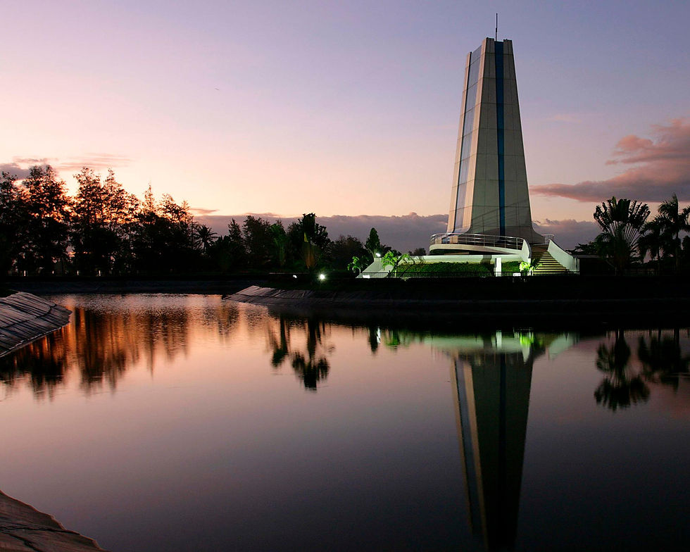 The central monument at Manila Memorial Park in Plaridel, Bulacan, during a sunny afternoon