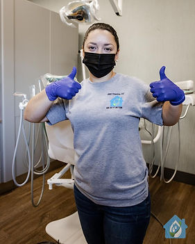S&H employee with thumbs up