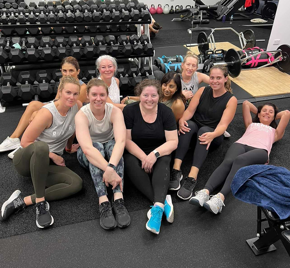 woman over 40 strength training in the gym