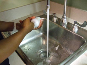 Clean breastpump in sink