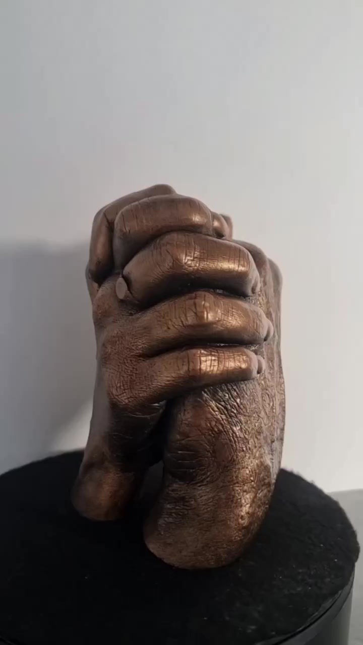 Thumbnail: Hand Entwined